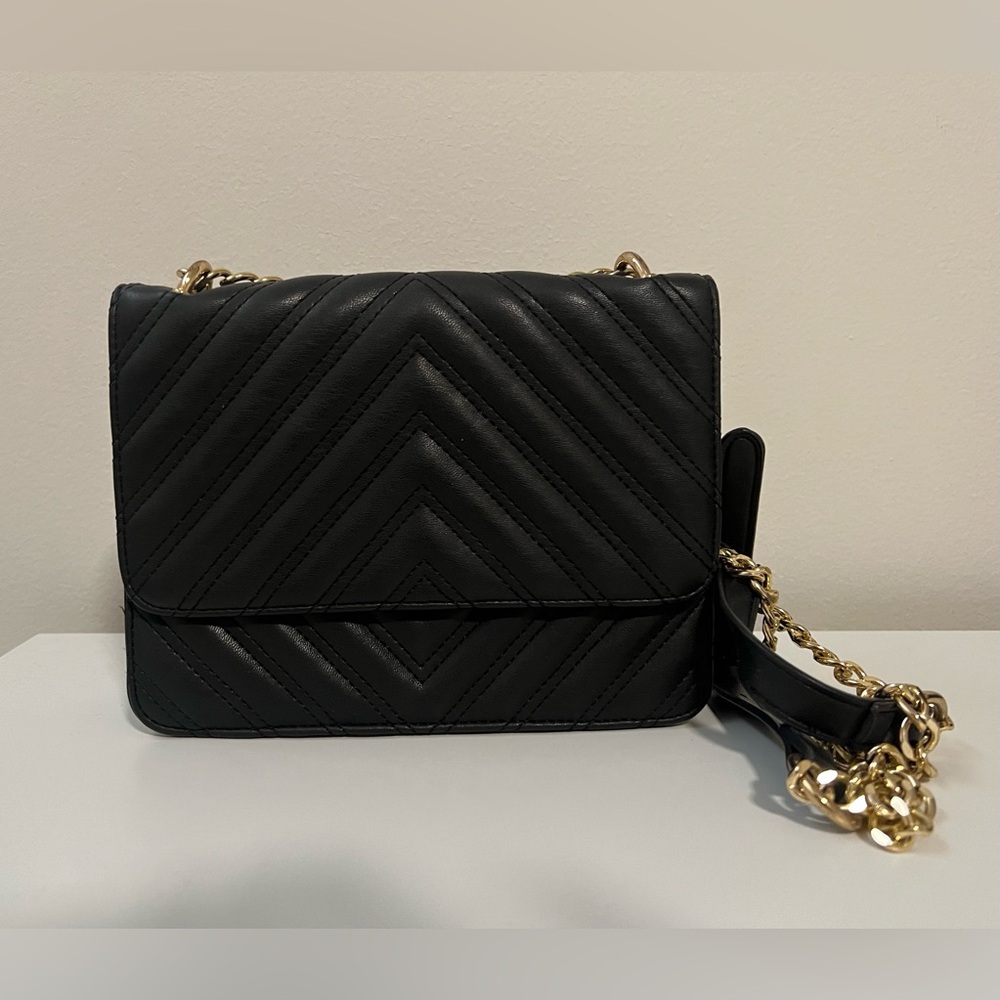 Black quilted cross body bag